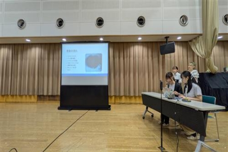 事業報告の様子